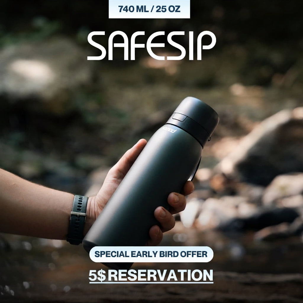A hand holding a matte dark gray Safesip 740 ml water bottle outdoors near water and rocks, with promotional text overlays reading 'SAFESIP', '740 ML / 25 OZ', 'SPECIAL EARLY BIRD OFFER', and '5$ RESERVATION'.