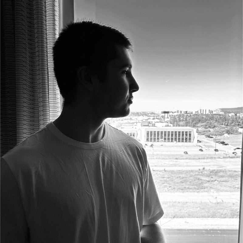 NOMAD co-founder Justin Lachapelle is looking beautiful sunset, a black and white picture, a monochrome image, taken from a cellphone. Make hydration fun and healthy again with NOMAD