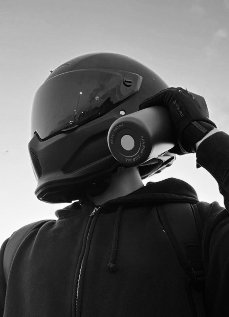 NOMAD SafeSip™ bottle used by traveler exploring mountains