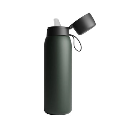Left side view of the NOMAD SafeSip insulated stainless steel filtered water bottle with leakproof flip-top lid, silicone mouthpiece and integrated carry loop. 