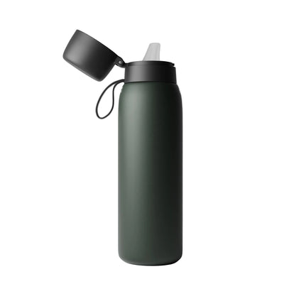 Left side view of the NOMAD SafeSip insulated stainless steel filtered water bottle with leakproof flip-top lid, silicone mouthpiece and integrated carry loop. 