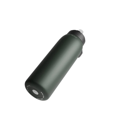 Floating view of the NOMAD SafeSip insulated stainless steel filtered water bottle in olive green, designed for everyday hydration, travel and outdoor adventures 